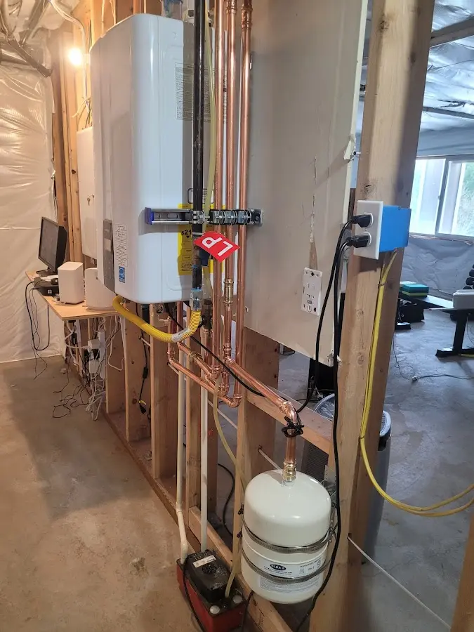 Licensed plumber repairing a kitchen sink in Springtown